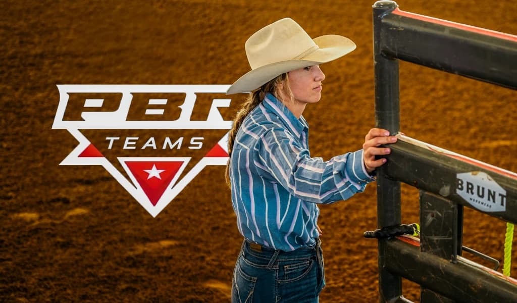 Jorden Halvorsen in a cowboy hat holding a gate at a rodeo arena with the PBR Teams logo visible.