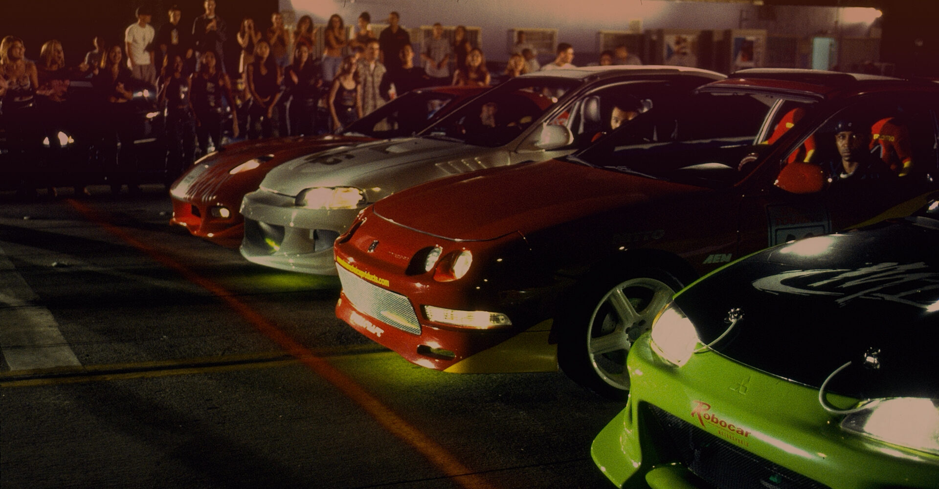 Cars getting ready for a competition